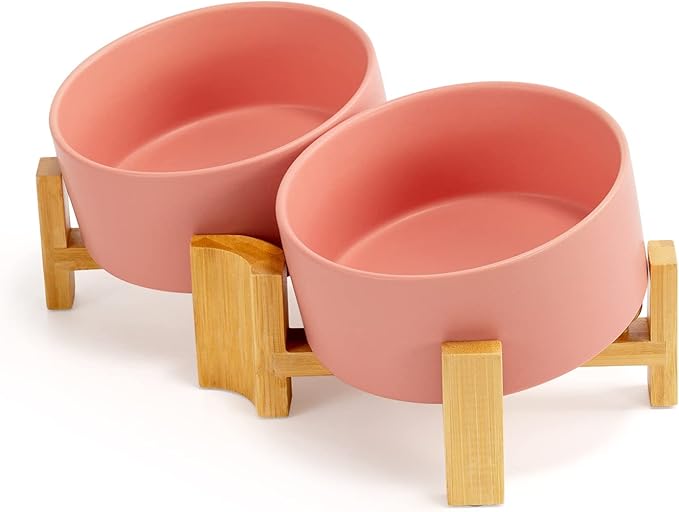 SPUNKYJUNKY 15° Slanted Ceramic Dog and Cat Bowl with Wooden Stand, Tilted Bulldog Food and Water Bowl No Slip Non-Spill for Cats Medium Dogs Big Face Pets 28.7 OZ (3.6 Cups, Pink × 2)